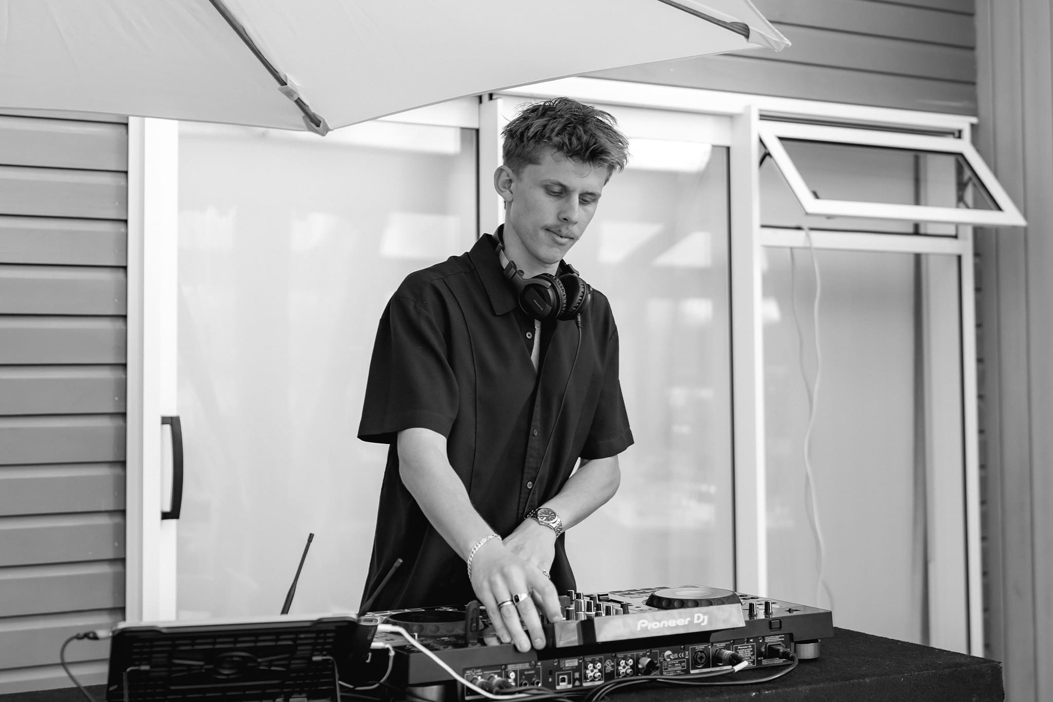 Wedding DJ on the decks providing professional DJ hire at a wedding.